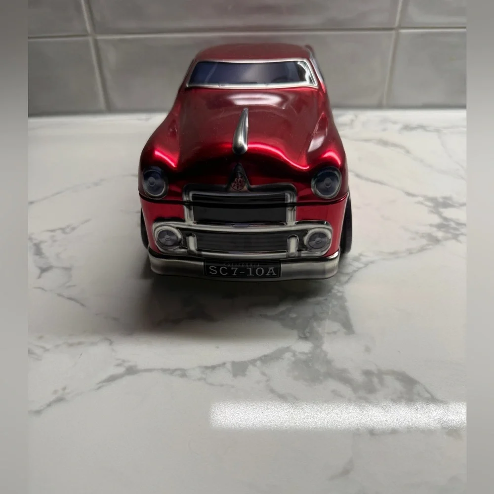 Silver Crane Company red classic car tin box
